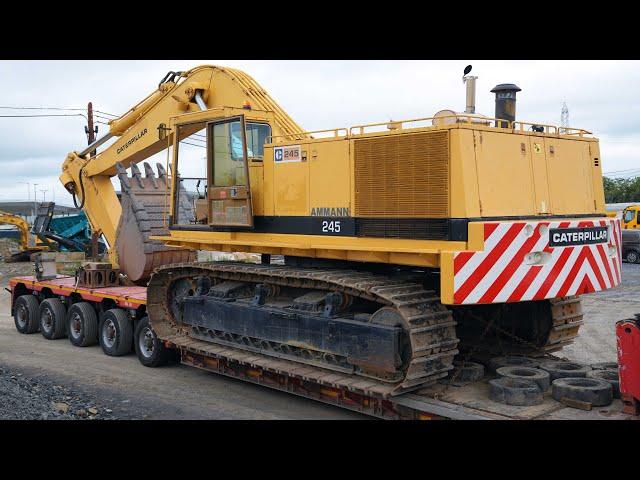 Moving the Caterpillar 245 Excavator