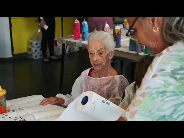 Neil Kerman Painting with Residents at Vila Mariana in Sao Brazil 2019