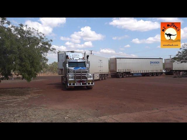 Massive road trains at roadhouses in outback Australia