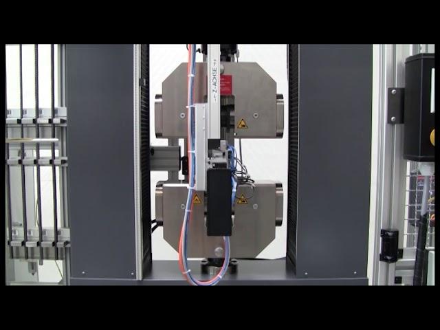 Fully Automated Tensile Testing System for Rebars