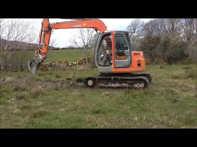 Hitachi digger at work