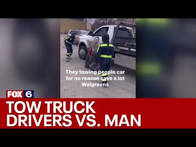 Confrontation between tow truck drivers, man | FOX6 News Milwaukee