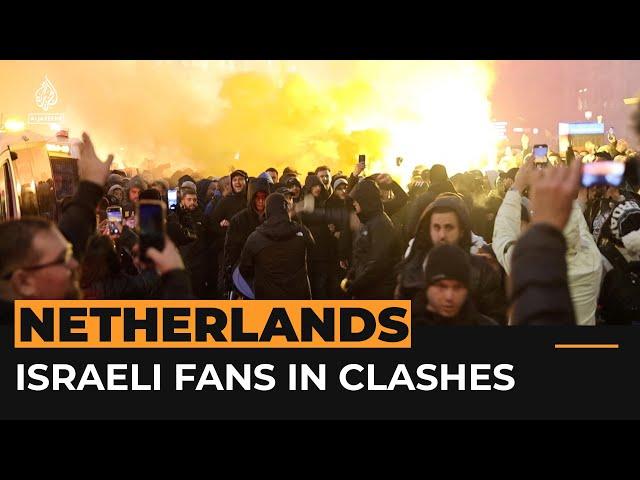 Israeli football fans clash with protesters in Amsterdam