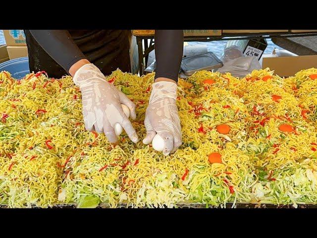 japanese street food - master chef make lot of okonomiyaki at once お好み焼き