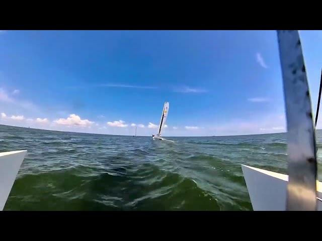 Jamie absolutely flying past us at Redfish Reach 2024 on his Nacra Inter 20!