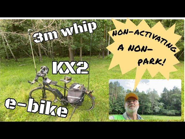 A leisurely non-activation of a non-park with KX2 , whip, e-bike in the company of a horse and sheep