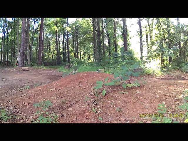 CJ and Me jumping our atvs.