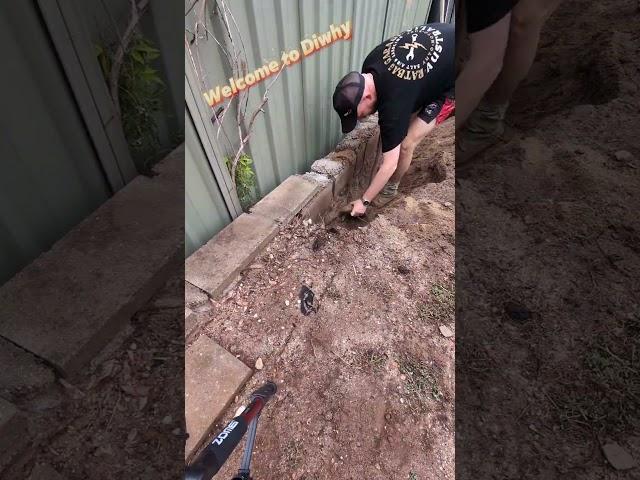 Digging and removing the retaining wall #handyman #diwhy #shorts