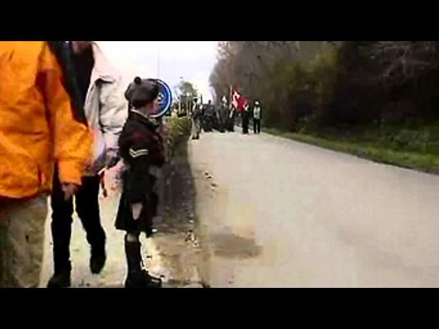 Young Boy Salutes Troops