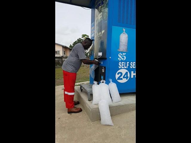 Ice and water vending machine