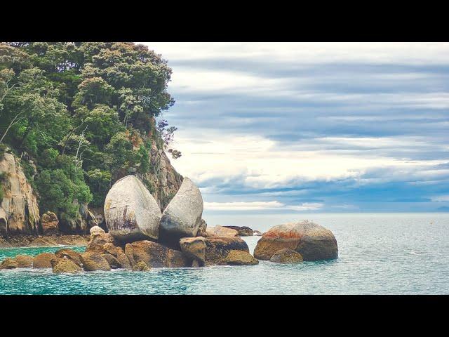 Kayaking in the pristine waters of Abel Tasman National Park, New Zealand