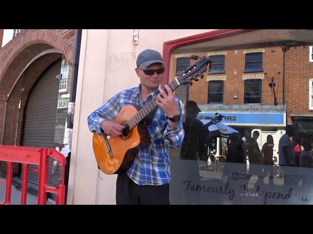 Does any one know the name of this person. Street Entertainers in Stratford Upon Avon (A6)