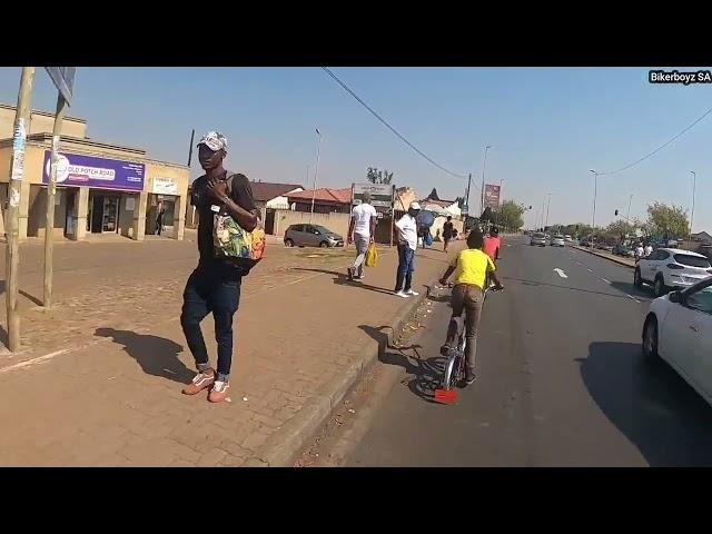 Bike riding in Soweto into Old Potch Road, Bara road