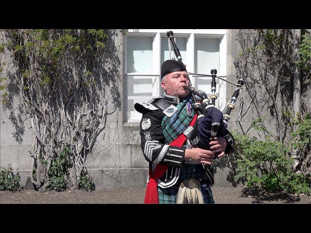 Champion piper Stuart Liddell playing "Braemar Gathering" outside Balmoral Castle in Scotland 2022