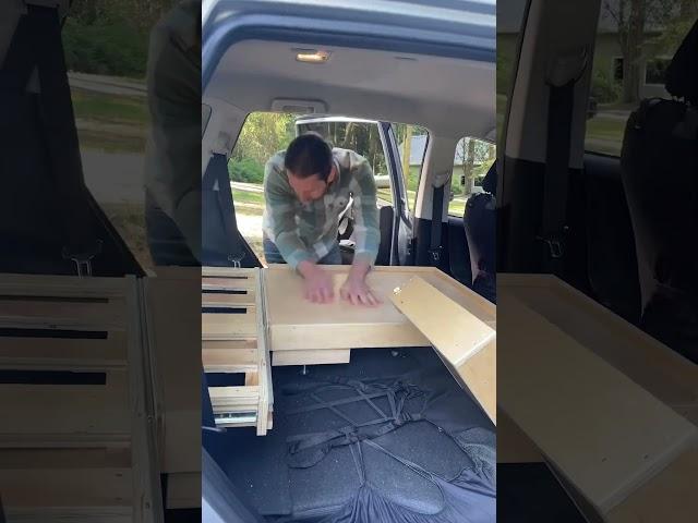 Camping in a RAV4?  This amazing unit lives in the rear cargo area and quickly deploys into a bed!