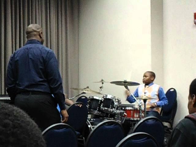 13 yrs old POOTER! Killing on drums at COGIC AIM 2012