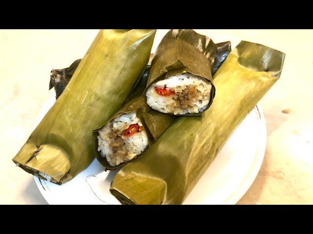 Minced meat rice cake wrapped with banana leaves ( arem arem ) 