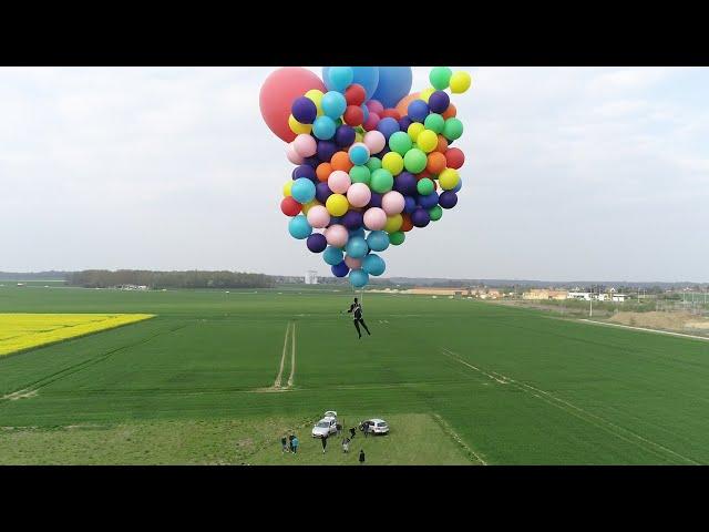 FLYING IN SKY   WITH BALLOONS