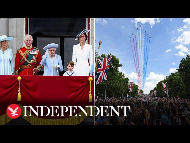 Queen watches spectacular flypast over Buckingham Palace alongside royal family