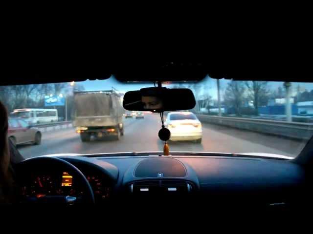 crazy chick driving Porsche on Russian streets