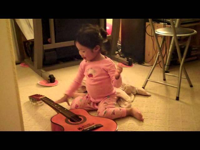 Sophie Yang Playing Guitar 2.10 Years