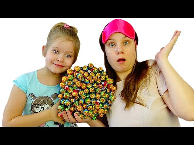 Lera and a cake made of harmful sweets for mom's birthday