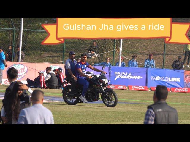 Gulshan Jha gives ride on his motorcycle which he win the final of the Asian T20 World Cup Qualifier