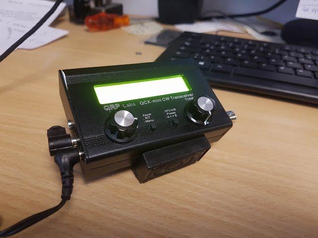 A homemade tilt stand for the QCX Mini QRP Transceiver from QRPLabs