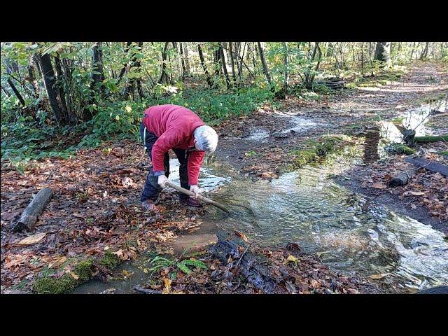 Culvert unblocking with a drain rod and plunger