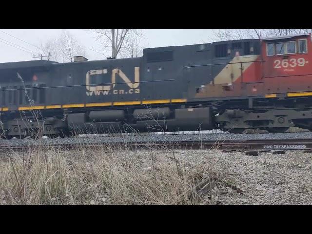 CN A438 passes Chatham CN yard. Apr 20, 2022