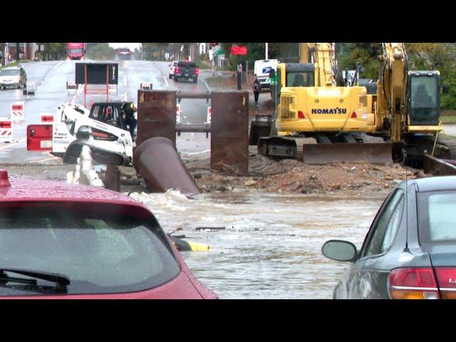 Woman who died in St. Louis floodwaters drove off recently removed bridge, eyewitness says