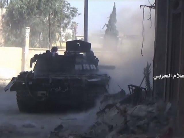 Raw: Syria Troops Move Through Aleppo