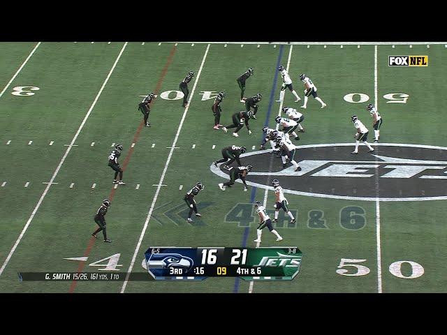 Geno Smith's back foot 24-yard throw to Smith-Njigba saves Seahawks drive