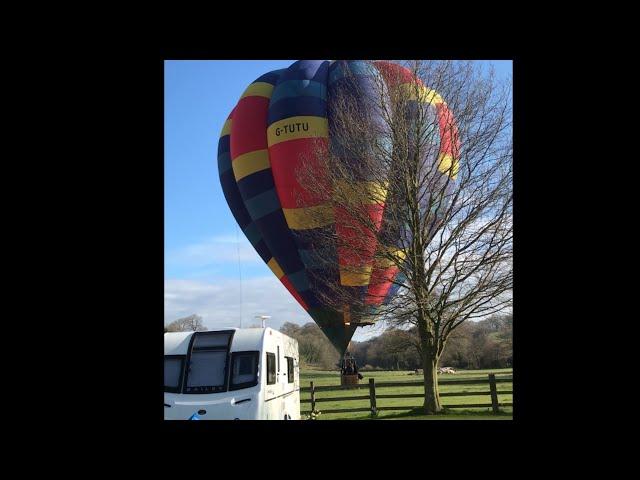 Unexpected hot air balloon lands at Greenacres Bungalow CL caravan site, Ellastone, Ashbourne 2/4/22