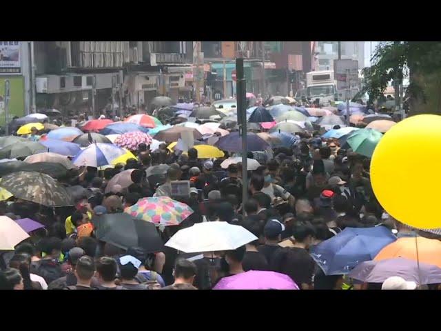 Hong Kong protesters hit streets for 12th weekend | AFP