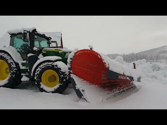 John Deere plowing 5.5 inches of snow.