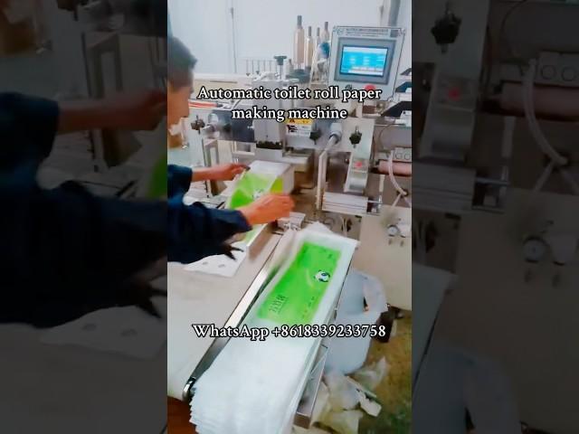 Automatic toilet tissue paper roll cutting and packing machine