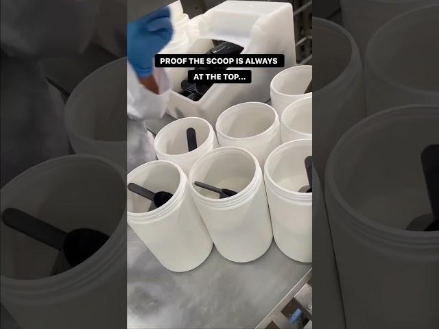 proof the scoops are at the top. behind the scene at myprotein factory