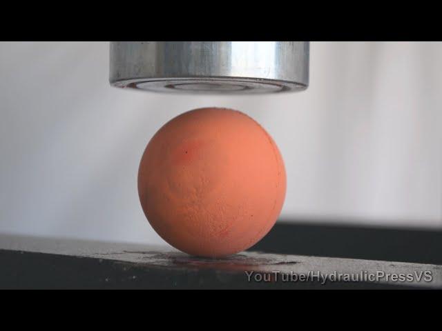 Racquetballs vs Hydraulic Press - Balls under press