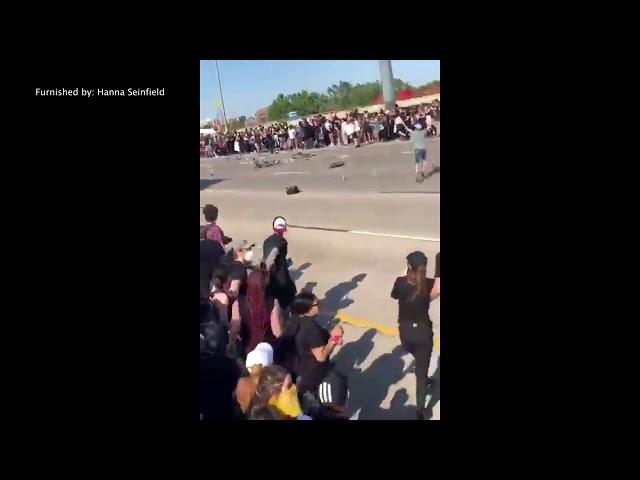 RAW: Semi truck drives through crowded I-35W during George Floyd protest