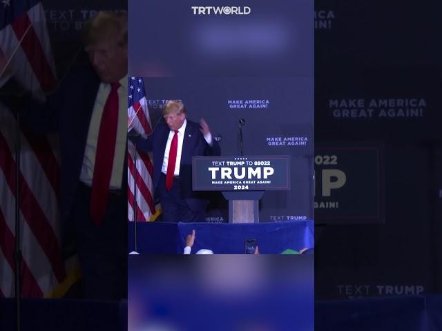 Trump mocks Biden by appearing clueless on stage