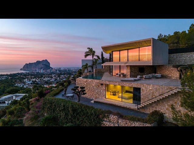 English-Spanish tour of ultra-modern villa in Benissa, Spain. Explore this unique property with us!