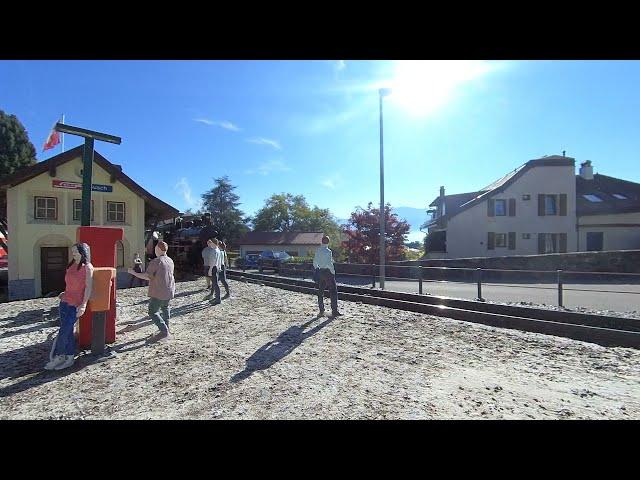 Mutzerbahn - The Engiadina #108 running across Susch station...