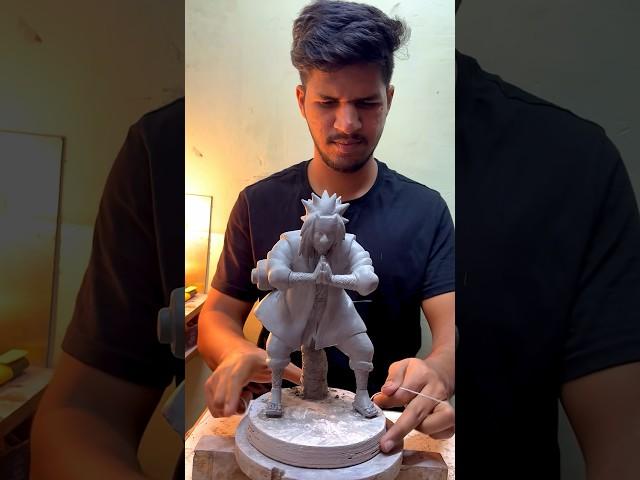 Removing support from anime character. #murtiartist #anime #sculpture #clayart