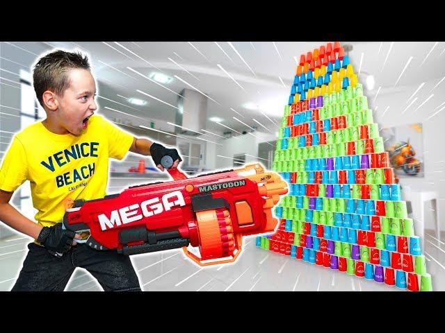 NERF Mega Mastodon vs GIANT Paper Cup Pyramid !!!