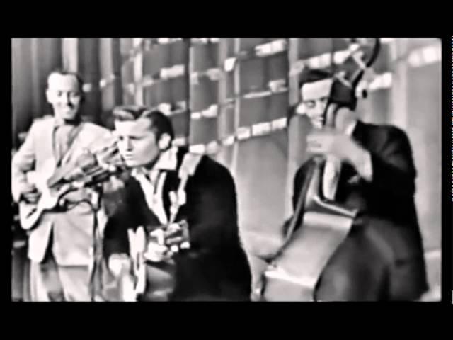 Johnny Burnette Trio-Train Kept A Rollin'