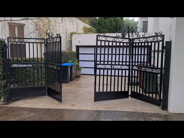 Bi-Fold Gates for Tapered Driveway - by The Motorised Gate Company