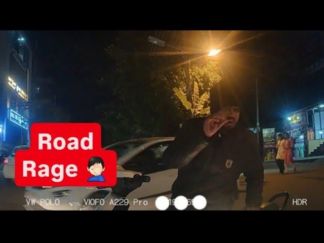 This guy blocks road and argues with car driver