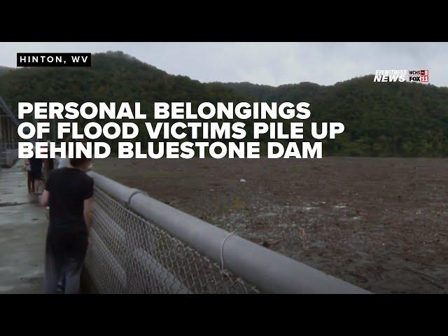 Trees, debris, personal belongings pile up at Bluestone Dam as hurricane floodwaters move through WV