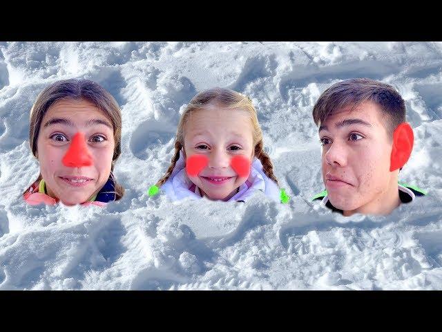 Nastya and friends play with snow and sculpt a snowman